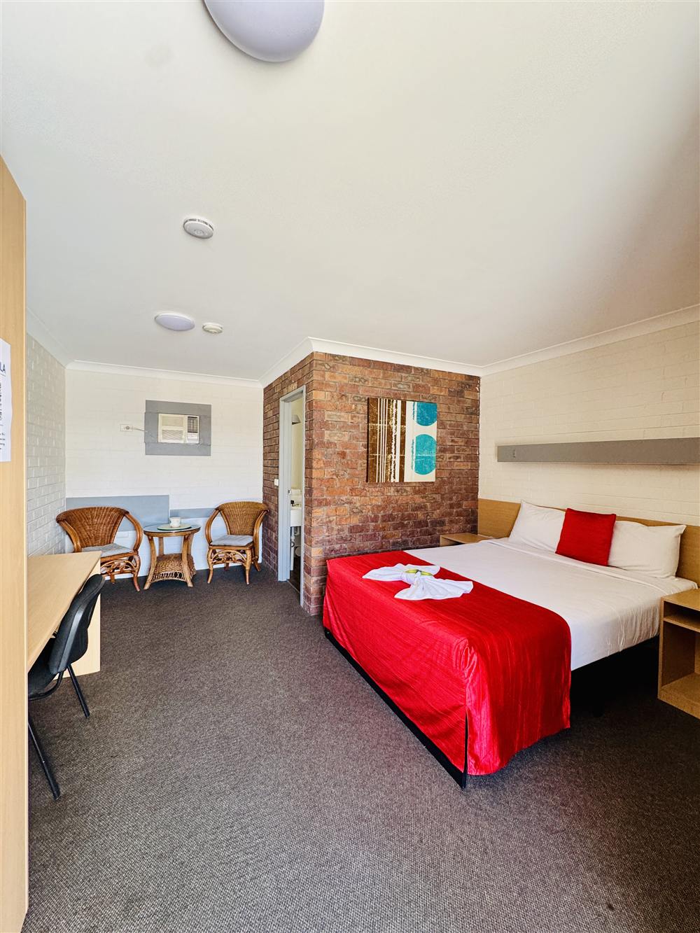 Bright bedroom with queen bed